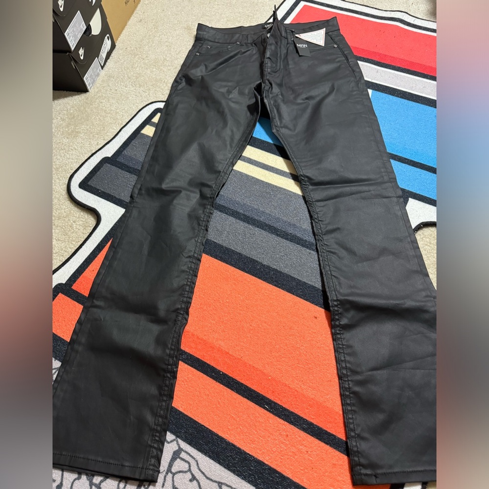 Black Waxed wide leg boohoo man pants size 34. Too small for Me. Never worn